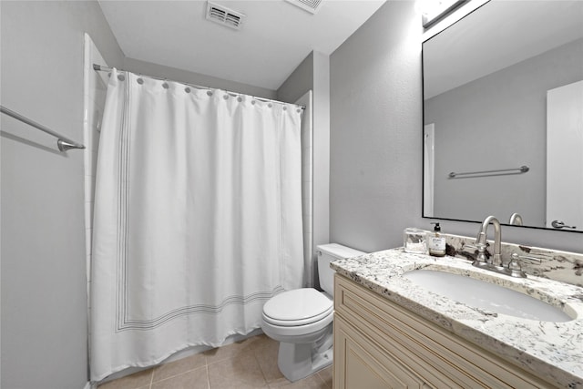3421 Paisano Trl, Plano, TX 75093 - bathroom with toilet, tile patterned floors, vanity, and a shower with curtain