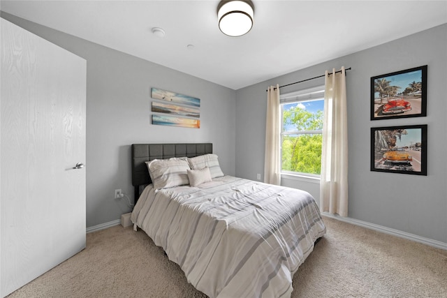 3421 Paisano Trl, Plano, TX 75093 - bedroom featuring light carpet and baseboards