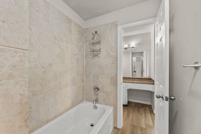 531 Norwood Cir E, Arlington, TX 76013 - bathroom featuring bathtub / shower combination and wood finished floors