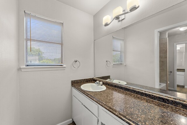 531 Norwood Cir E, Arlington, TX 76013 - full bathroom with plenty of natural light, vanity, and baseboards