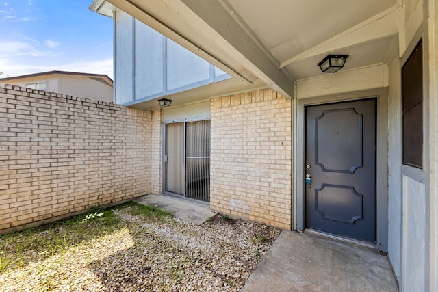 531 Norwood Cir E, Arlington, TX 76013 - entrance to property featuring brick siding