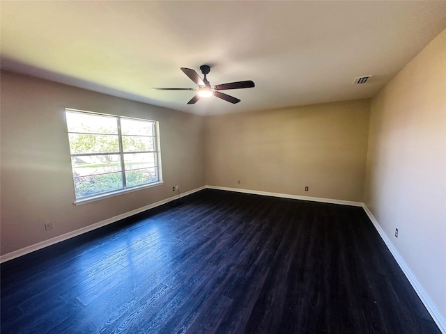 202 Wanda Dr, Winnsboro, TX 75494 - unfurnished room with a ceiling fan, dark wood-type flooring, and baseboards
