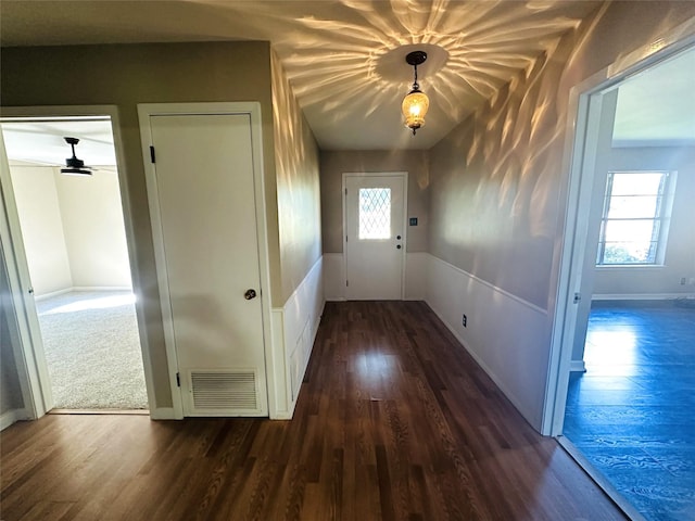 202 Wanda Dr, Winnsboro, TX 75494 - doorway featuring dark wood-type flooring and baseboards