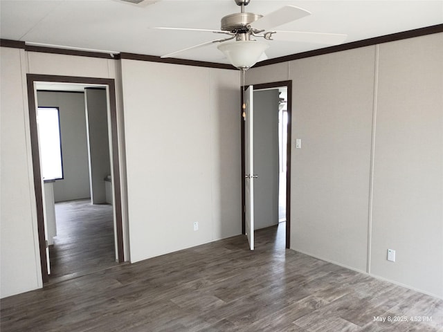 124 Eldorado St, Decatur, TX 76234 - unfurnished room featuring a ceiling fan, wood finished floors, and ornamental molding