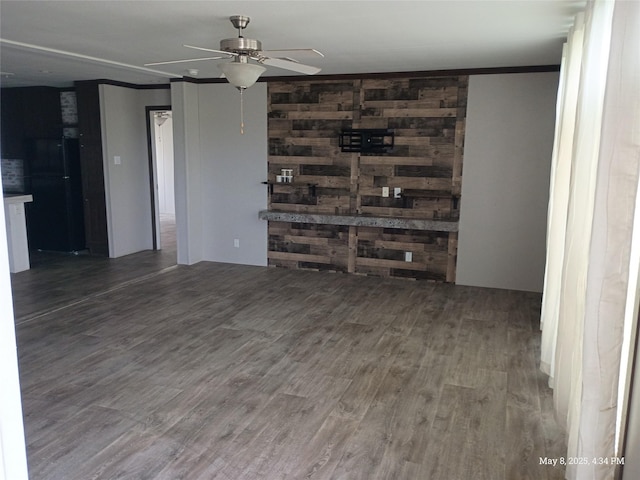 124 Eldorado St, Decatur, TX 76234 - empty room featuring wood finished floors and ceiling fan