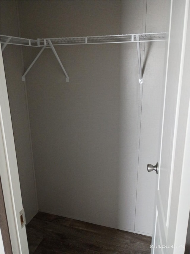 124 Eldorado St, Decatur, TX 76234 - spacious closet with dark wood-style floors
