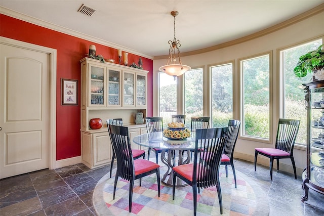 6700 Lions Gate Ct, Arlington, TX 76001 - dining room featuring baseboards and crown molding