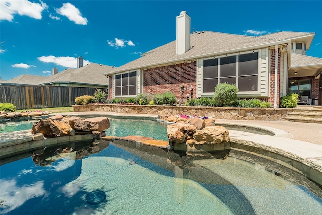 9521 Cholla Cactus Trl, Fort Worth, TX 76177 - view of pool with a pool with connected hot tub and fence