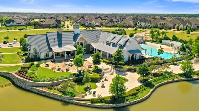 4008 Prickly Pear Ave, Aubrey, TX 76227 - aerial view of residential area with a pool and a large body of water