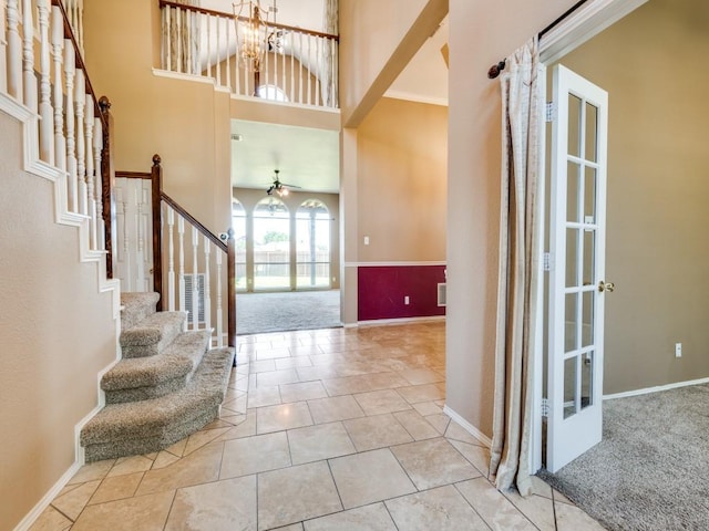 2540 Briardale Dr, Carrollton, TX 75006 - entrance foyer featuring stairs, a towering ceiling, baseboards, and a chandelier
