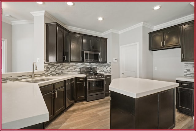 5005 Odeum Ct, Fort Worth, TX 76244 - kitchen with stainless steel appliances, a sink, ornamental molding, backsplash, and light wood-type flooring