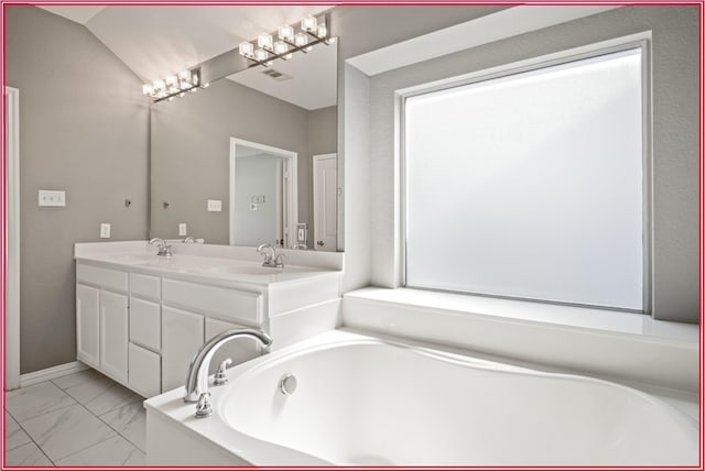 5005 Odeum Ct, Fort Worth, TX 76244 - full bath with marble finish flooring, double vanity, and a tub