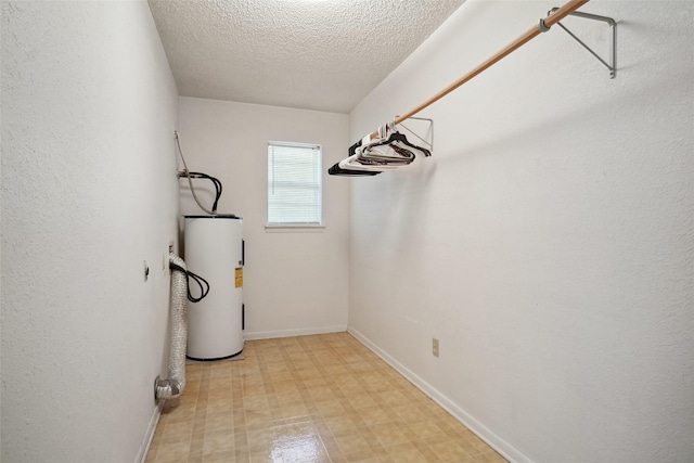 1508 Raborn Dr, Bowie, TX 76230 - spacious closet with electric water heater and light flooring