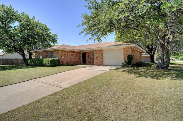 1508 Raborn Dr, Bowie, TX 76230 - single story home with brick siding, a garage, and concrete driveway