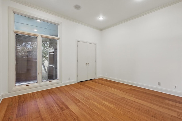 1424 Hidden Oaks Cir, Corinth, TX 76210 - unfurnished room featuring light wood-type flooring, crown molding, baseboards, and recessed lighting