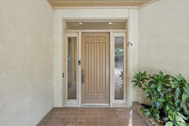 1424 Hidden Oaks Cir, Corinth, TX 76210 - view of exterior entry with stucco siding