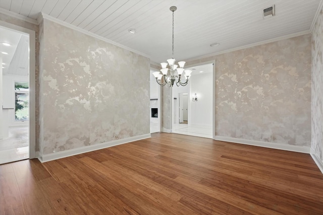 1424 Hidden Oaks Cir, Corinth, TX 76210 - unfurnished dining area featuring wood finished floors, wallpapered walls, a chandelier, crown molding, and baseboards
