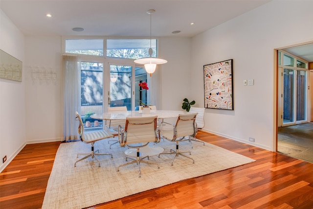 5848 Colhurst St, Dallas, TX 75230 - dining space with wood finished floors, baseboards, and recessed lighting
