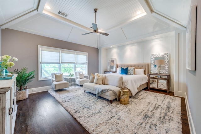 bedroom featuring dark wood finished floors, baseboards, a ceiling fan, and lofted ceiling