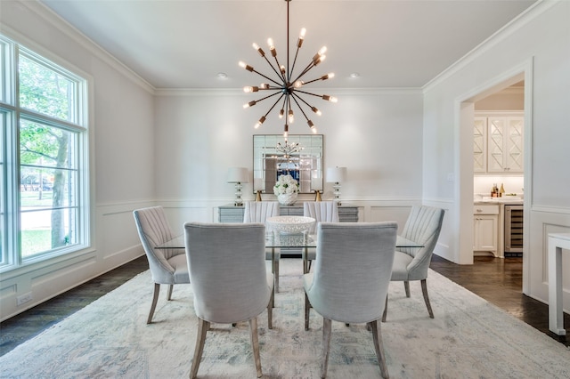 dining area featuring a chandelier, plenty of natural light, crown molding, beverage cooler, and dark wood-style floors