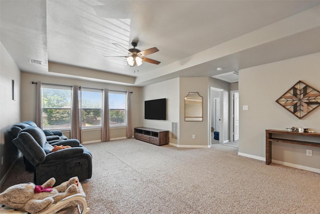 4624 Southpointe Dr, Richardson, TX 75082 - living room featuring baseboards, a ceiling fan, light carpet, and a raised ceiling