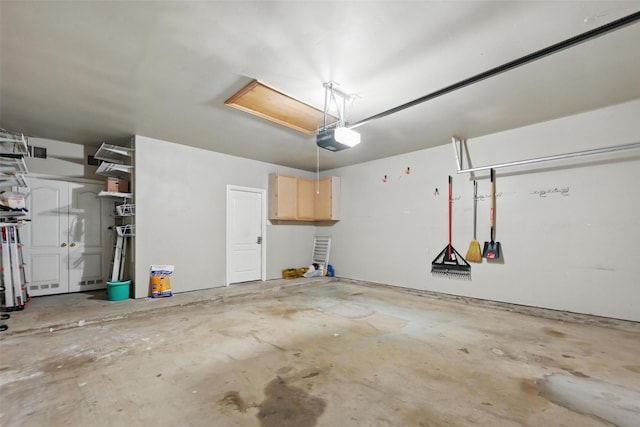 4624 Southpointe Dr, Richardson, TX 75082 - garage featuring a garage door opener