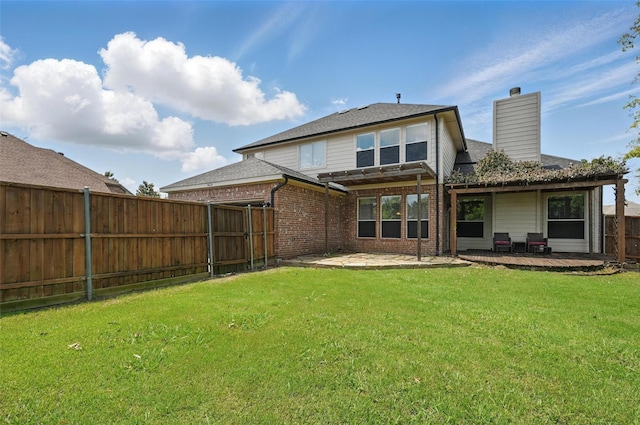 4624 Southpointe Dr, Richardson, TX 75082 - back of house with a chimney, brick siding, and a patio area