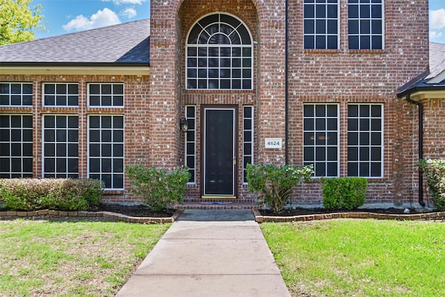 4624 Southpointe Dr, Richardson, TX 75082 - entrance to property with brick siding, a lawn, and roof with shingles