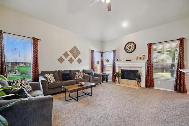 4624 Southpointe Dr, Richardson, TX 75082 - living room with carpet floors, a tiled fireplace, ceiling fan, high vaulted ceiling, and baseboards
