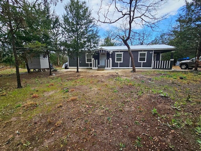 325 Fcr 1211, Fairfield, TX 75840 - view of front of house featuring metal roof