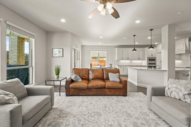 3525 Beaumont Dr, Wylie, TX 75098 - living room with ceiling fan, recessed lighting, and wood finished floors
