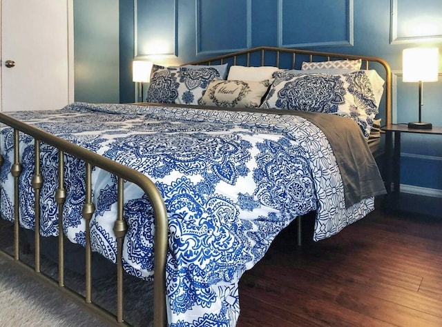 4859 Cedar Springs Rd Unit 342, Dallas, TX 75219 - bedroom with wood finished floors