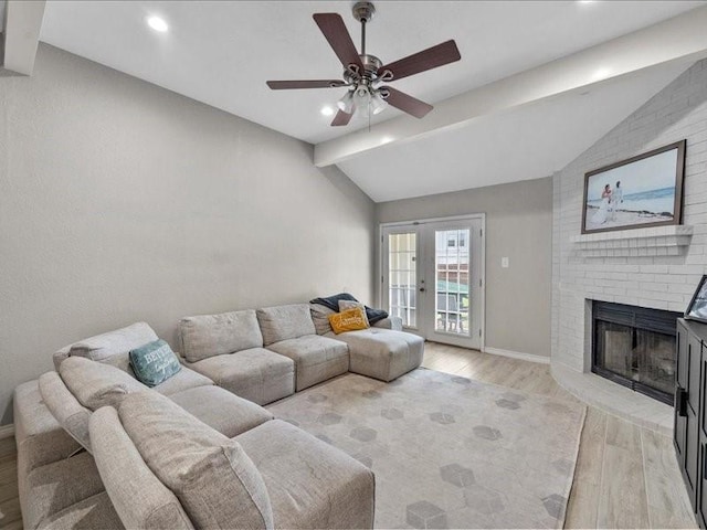 1008 Breezewood Dr, Arlington, TX 76017 - living area featuring light wood-style floors, a fireplace, baseboards, ceiling fan, and recessed lighting