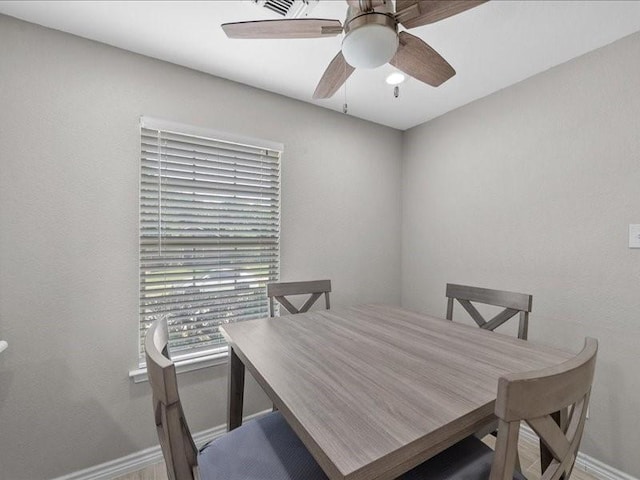 1008 Breezewood Dr, Arlington, TX 76017 - dining area featuring baseboards and a ceiling fan