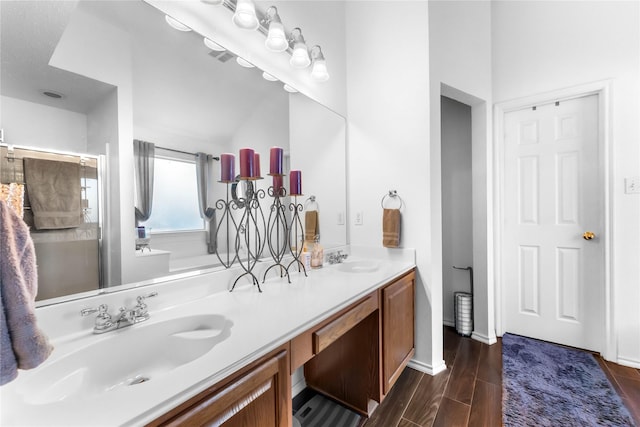 3953 Silver Springs Dr, Fort Worth, TX 76123 - bathroom featuring double vanity and wood finished floors