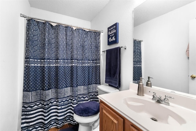 3953 Silver Springs Dr, Fort Worth, TX 76123 - bathroom with toilet, a textured ceiling, vanity, and curtained shower