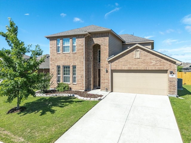 14361 Mariposa Lily Ln, Fort Worth, TX 76052 - view of front facade featuring brick siding, an attached garage, driveway, and a shingled roof