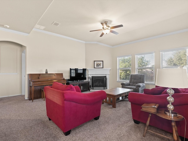 14361 Mariposa Lily Ln, Fort Worth, TX 76052 - carpeted living room with ceiling fan, ornamental molding, a fireplace, and arched walkways