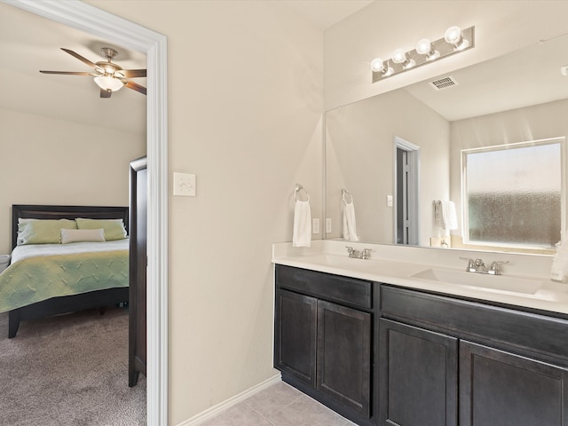 14361 Mariposa Lily Ln, Fort Worth, TX 76052 - ensuite bathroom with ceiling fan, double vanity, baseboards, and tile patterned floors