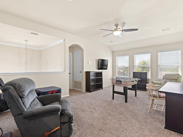 14361 Mariposa Lily Ln, Fort Worth, TX 76052 - living area featuring ceiling fan, carpet floors, arched walkways, baseboards, and ornamental molding