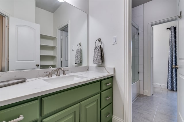 full bath with vanity, shower / bathtub combination, and tile patterned flooring