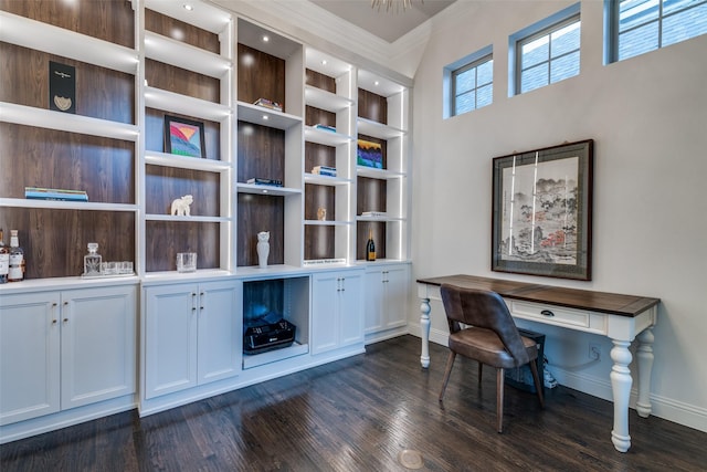 office with baseboards, dark wood-style flooring, and ornamental molding