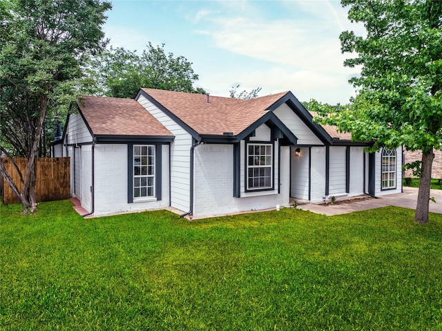 3809 Glengate Dr, Arlington, TX 76016 - rear view of house with brick siding and roof with shingles