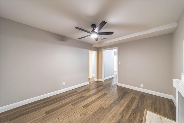 3809 Glengate Dr, Arlington, TX 76016 - empty room with ceiling fan, baseboards, and dark wood-style floors
