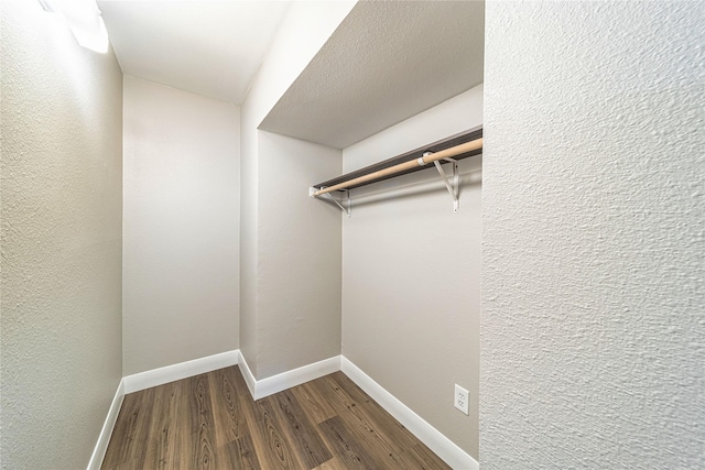 3809 Glengate Dr, Arlington, TX 76016 - spacious closet featuring dark wood-style floors