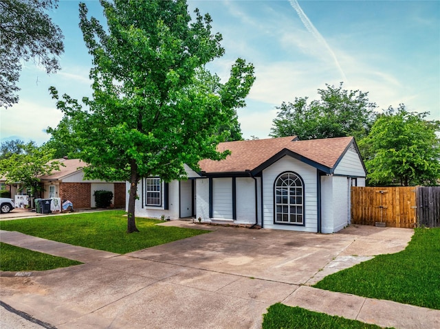 3809 Glengate Dr, Arlington, TX 76016 - ranch-style house with brick siding, a shingled roof, concrete driveway, and a gate