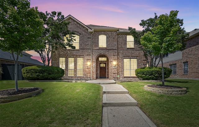2726 Bandolier Ln, Frisco, TX 75033 - view of front facade featuring brick siding and a yard