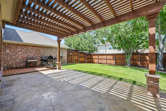 2726 Bandolier Ln, Frisco, TX 75033 - fenced backyard featuring area for grilling, a pergola, and a patio