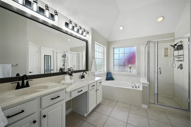 2726 Bandolier Ln, Frisco, TX 75033 - bathroom with double vanity, a shower stall, a bath, lofted ceiling, and tile patterned flooring