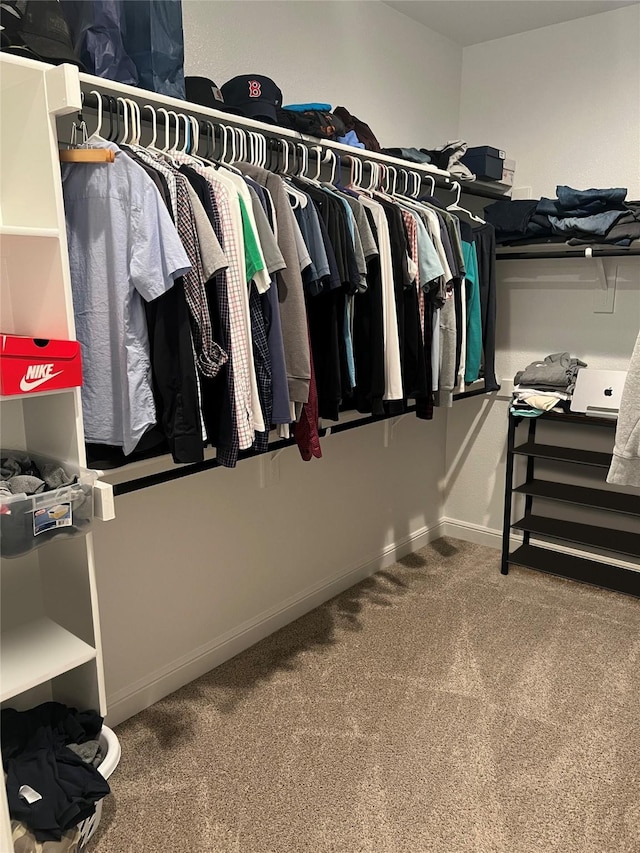 5266 Meadow Ln, Krum, TX 76249 - spacious closet featuring carpet floors